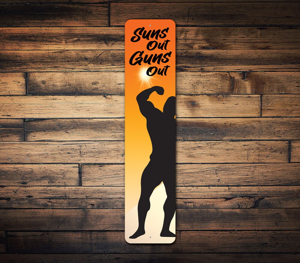 Suns Out Guns Sign, Beach