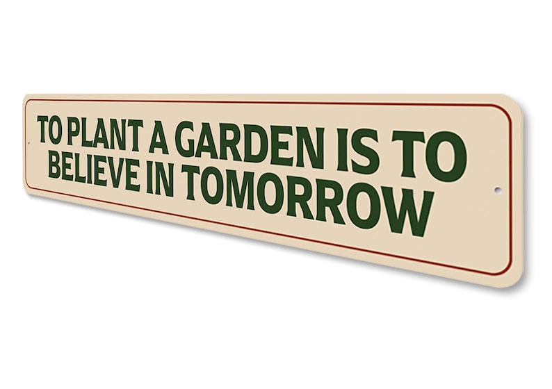 a sign that says to plant a garden is to believe in tomorrow