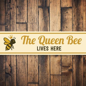 The Queen Bee Lives Here Sign, Bee Wall Decor, Bee Lover Gift, Farmhouse Sign, Bee Hive Sign, Home Bee Decor, Queen Bee Gift - Metal Sign