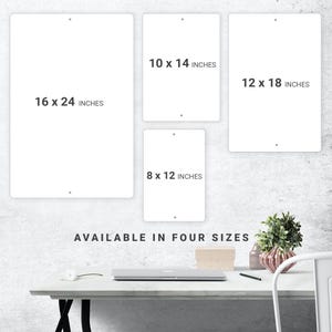 a white table with a white chair next to it