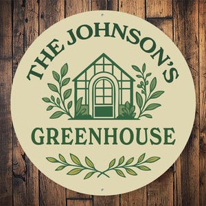 A round sign with the text "THE JOHNSON'S GREENHOUSE" and an illustration of a greenhouse.