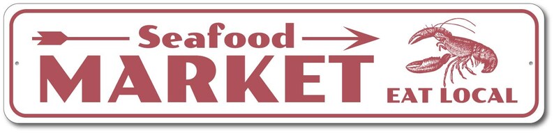 Op de afbeelding: Wit rechthoekig bord met rode tekst en een rode kreeft illustratie. Het bord staat "Vismarkt" met een pijl naar rechts en de woorden "Eet lokaal" onder de kreeft.