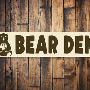 Signo de la guarida del oso, decoración del pabellón de caza, signo del oso de la cabina, decoración de la pared de la guarida del oso, signo del albergue del bosque, signo del oso del bosque, signo lindo del oso - signo de metal