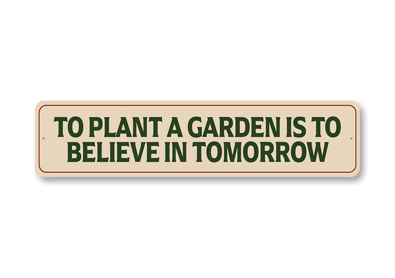 a sign that says to plant a garden is to believe in tomorrow