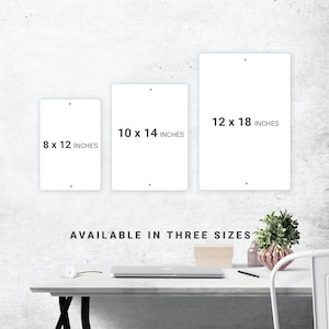 a white table with a white chair next to it