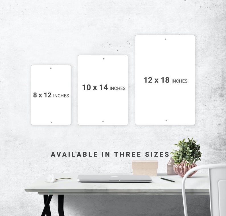 a white table with a white chair next to it