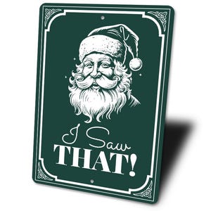 a green sign with a picture of a santa clause