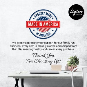 a table with a laptop and a potted plant on it