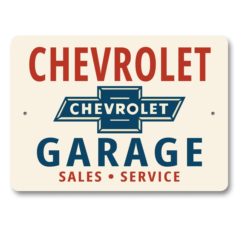 a sign for a Chevrolet garage that includes the Chevrolet logo and text indicating that it is a sales and service center.