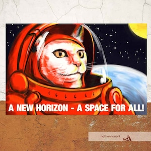 May include: A white cat wearing a red astronaut suit with a blue and white planet in the background. The text "A NEW HORIZON - A SPACE FOR ALL!" is below the cat. The artist's name "nathanmunart" is in the bottom right corner.