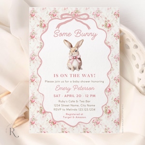 May include: Baby shower invitation with a floral background and a pink bow at the top. The invitation features a watercolor illustration of a bunny wearing a pink bow. Text includes "Some Bunny Is On The Way!" and details for Emery Peterson's baby shower.