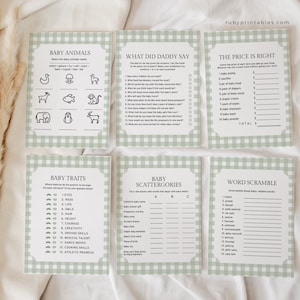 May include: A set of printable baby shower games with a green and white gingham pattern. The games include "Baby Animals", "What Did Daddy Say", "The Price is Right", "Baby Traits", "Baby Scattergories", and "Word Scramble".