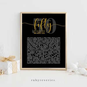 May include: A black and gold printable poster with the text "fifty reasons we love you" and a list of reasons in gold text. The poster is framed in a gold frame.