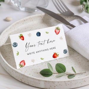 Plantilla para tarjeta de lugar con lazo de bayas, baby shower, despedida de soltera, etiqueta para bufé de comida, tarjeta de presentación plana con pliegues en forma de carpa, minimalista moderna