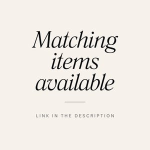 May include: Cream-colored background with black text that reads "Matching items available." Below the text is a thin black line, and beneath that, the text "LINK IN THE DESCRIPTION."