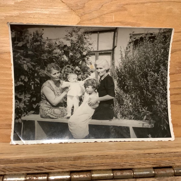 Old snapshot of 2 women grandmother with cute kids vintage photo rppc real photo post card 60s 70s black white candid family mother daughter