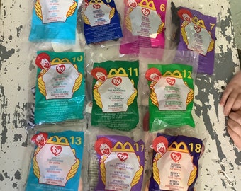 Ty McDonald’s beanie babies lot of 12 in package 2000 toy animals, bunny fish rhino lion orangutang seahorse white tiger mini beany buddies