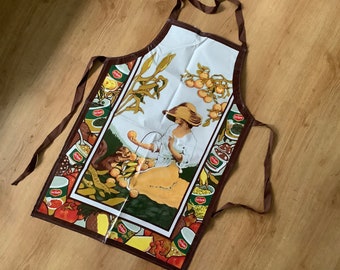 Vintage schort (katoen + pvc) met del monte reclame, zeer schoon, te gebruiken voor bakken, barbecue, schoonmaken, knutselen of uitstallen.