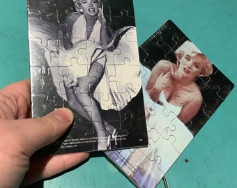 Marilyn Monroe puzzle postcards, 2 sealed old stock featuring pin-up actress model bombshell, for Marilyn puzzle or postcard collector gift