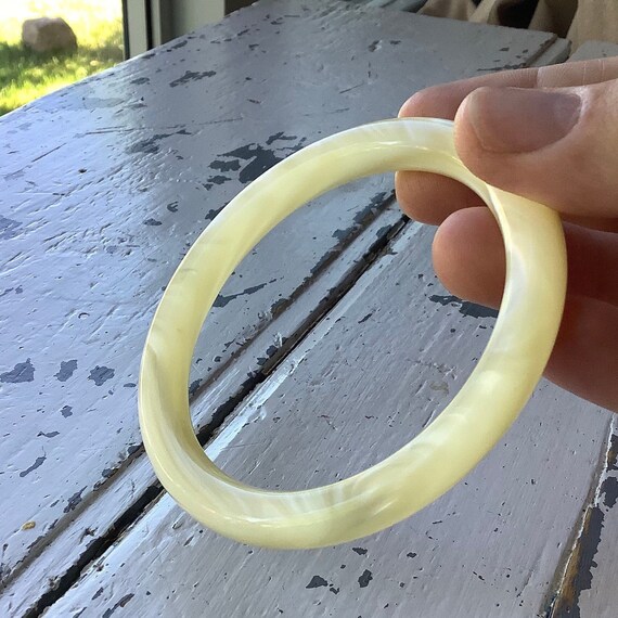 Iridescent optic white plastic bangle, vintage mo… - image 1