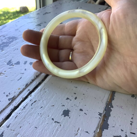 Iridescent optic white plastic bangle, vintage mo… - image 3