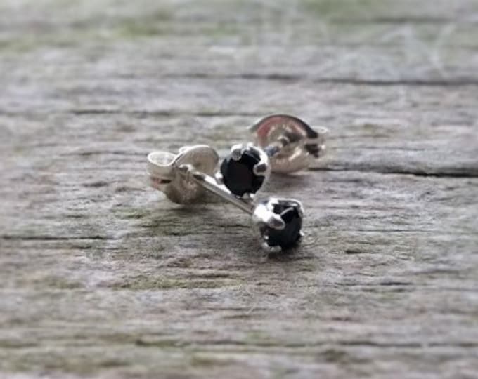 Black spinel studs
