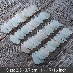Long-shaped frosted sea glass set 50pcs. Oblong elongated beach glass wholesale. Sea glass for jewelry and craft.