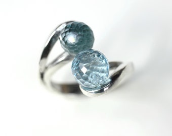 TOI ET MOI Ring aus Silber mit facettierten blauen Topasperlen