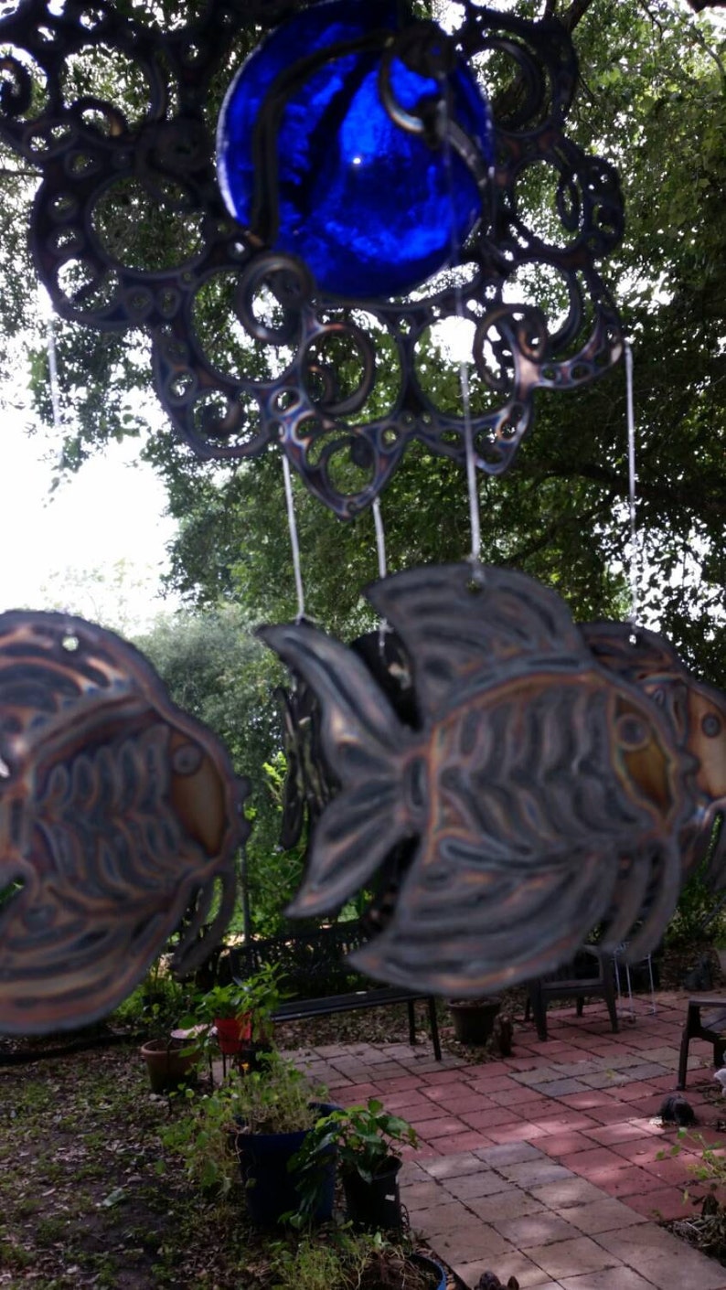 Tropical fish wind chime hanging from Sun with 3 inch blue glass float