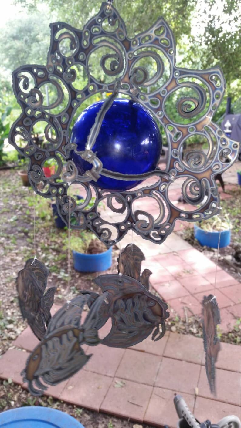 Tropical fish wind chime hanging from Sun with 3 inch blue glass float