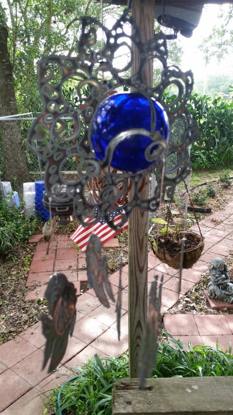 Tropical fish wind chime hanging from Sun with 3 inch blue glass float