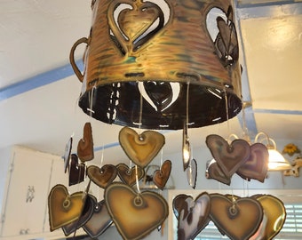 Heart wind chime Round hearts with hearts hanging.