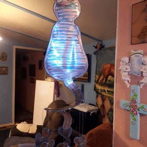 Calico Cat wind chime with hearts hanging