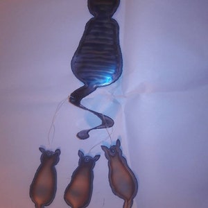 Calico cat Wind chime with 3 cats hanging.