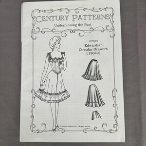 May include: A vintage sewing pattern titled "Century Patterns" featuring an illustration of Edwardian circular drawers. The pattern includes a drawing of a woman in a dress and several diagrams of the garment. The text reads "Underpinning the Past".