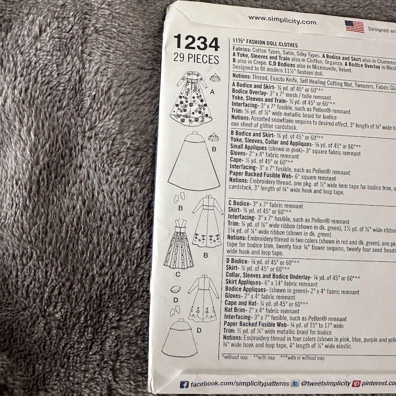 May include: A Simplicity pattern sheet for 11.5" fashion doll clothes, featuring illustrations of various doll dresses and accessories. The pattern includes instructions and fabric requirements for creating multiple doll outfits. The sheet is white with black text.