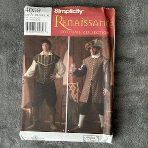 May include: Simplicity 4059 Renaissance Costume Collection sewing pattern envelope for size A, including XS, S, M, L, and XL. The front displays two historical-style outfits with vests, long-sleeved shirts, breeches, and a feathered hat.