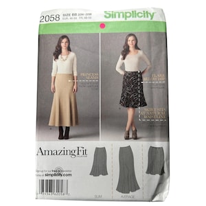 May include: Simplicity sewing pattern 2058, featuring two skirt designs. The pattern includes sizes 20W-26W. The package has a green and white color scheme, with images of the finished skirts and text describing features.
