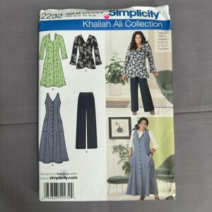 May include: Simplicity sewing pattern 2232 from the Khaliah Ali Collection. The envelope displays illustrations and photographs of a long button-front dress and a floral print jacket with matching wide-leg trousers, including size AA 10-18.
