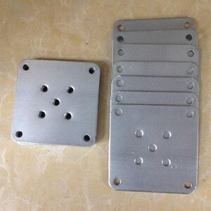 Piastra in ferro per gambe da tavolo (viti incluse), guarnizione di fissaggio per piedini del divano, ferramenta in metallo, piastre a T per fissaggio di montaggio gambe, MF001A