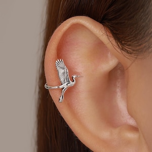 Örhänge i sterlingsilver med hägerkran - Piercingfri manschett