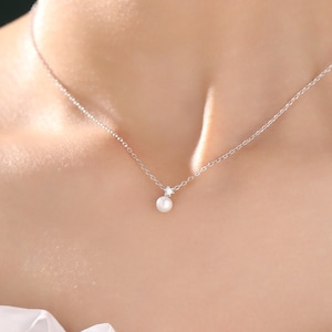 Natural Pearl and CZ Necklace in Sterling Silver With a