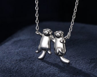 Tiny Otter Holding Hands Pendant Necklace in Sterling Silver, Silver or Gold or Rose Gold, Nature Inspired Animal Necklace