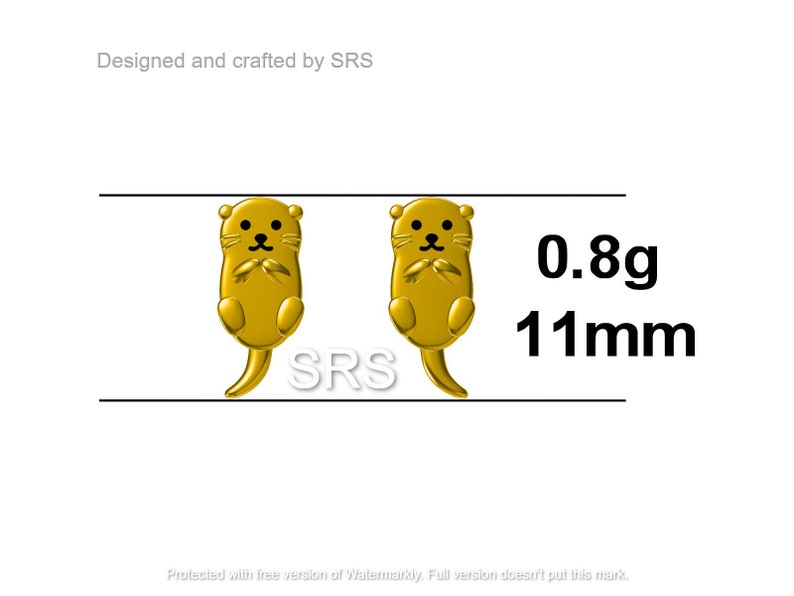May include: A pair of gold-colored otter earrings, each measuring 11mm in size and weighing 0.8 grams. The earrings are designed and crafted by SRS.