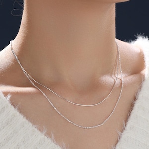 Colar de camada dupla em prata de lei com corrente satélite e corrente cobra, prata, ouro ou ouro rosa.