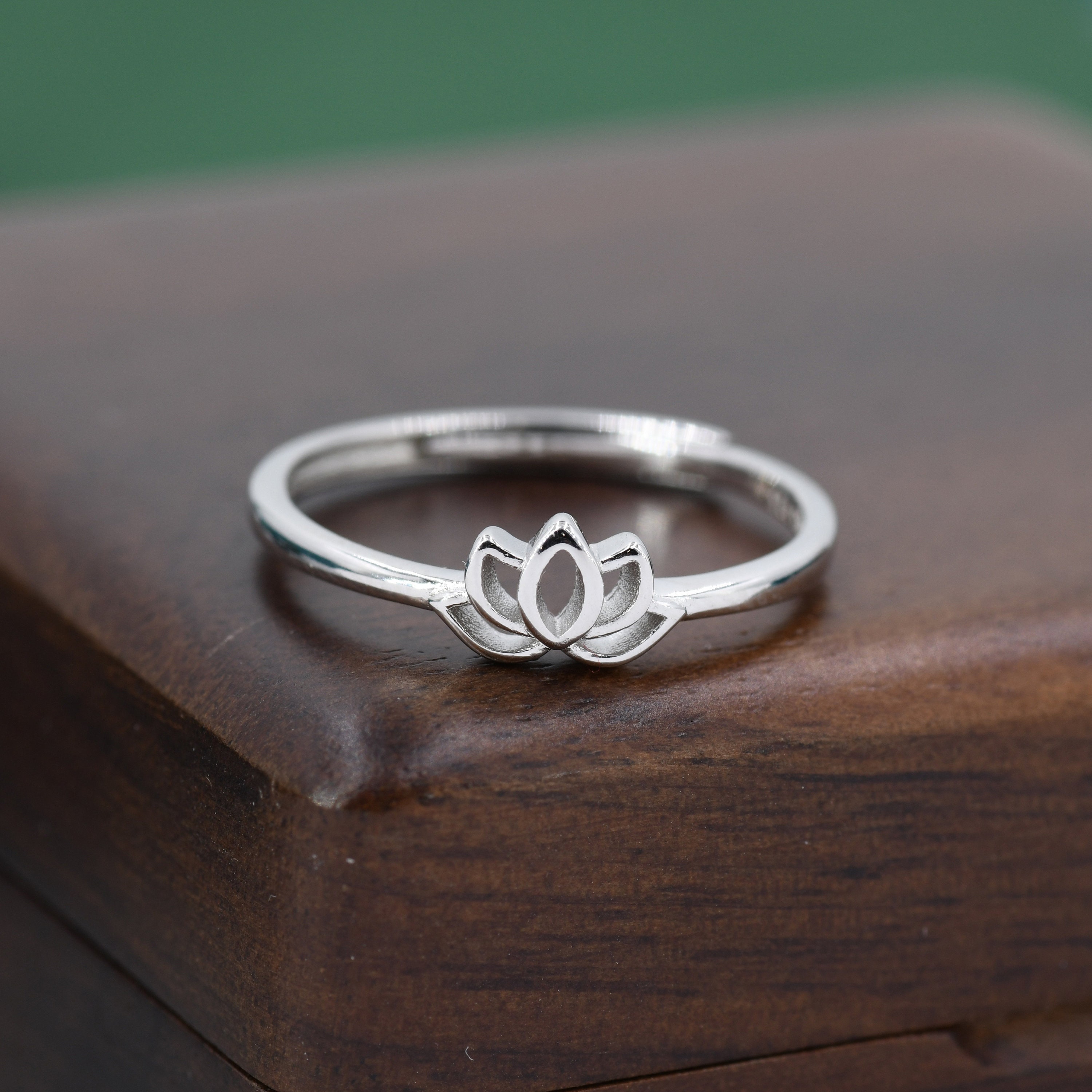 Silver triple wrap store lotus ring