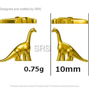 May include: A gold-colored dinosaur figurine, standing on a white background. The figurine is 10mm tall and weighs 0.75g. The text "Designed and crafted by SRS" is at the top of the image.