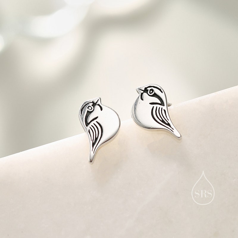 •IO• emerald sparrow + silver earrings