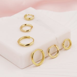 Aros minimalistas Huggie en plata de ley, de 6 mm, 8 mm, 9 mm, 10 mm, 12 mm y 14 mm, en oro rosa o dorado. Aros sencillos.