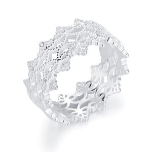 May include: A silver-toned ring featuring an intricate, openwork filigree pattern that resembles lace. The band has a scalloped, crown-like edge with repeating floral-inspired motifs throughout the entire circumference of the metal ring.